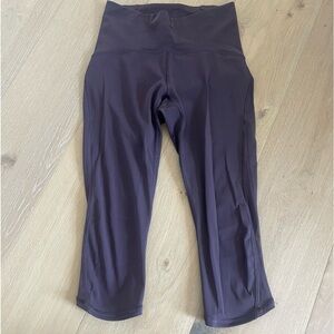 Lululemon capri leggings with mesh side size 4